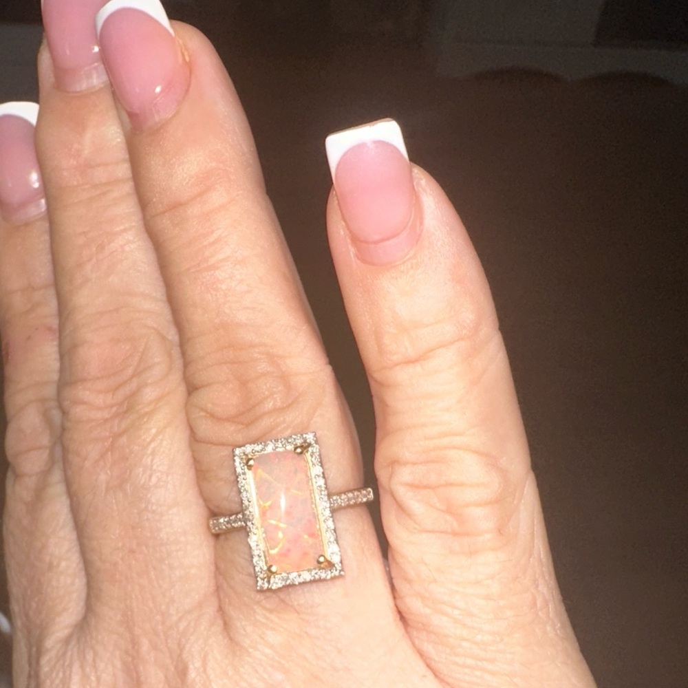 Elegant Opal and Diamond Ring